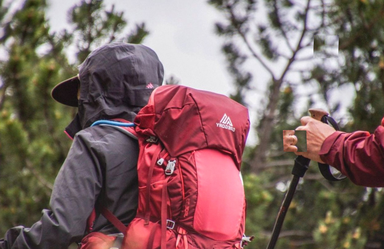Guide and guest on a high ridge
